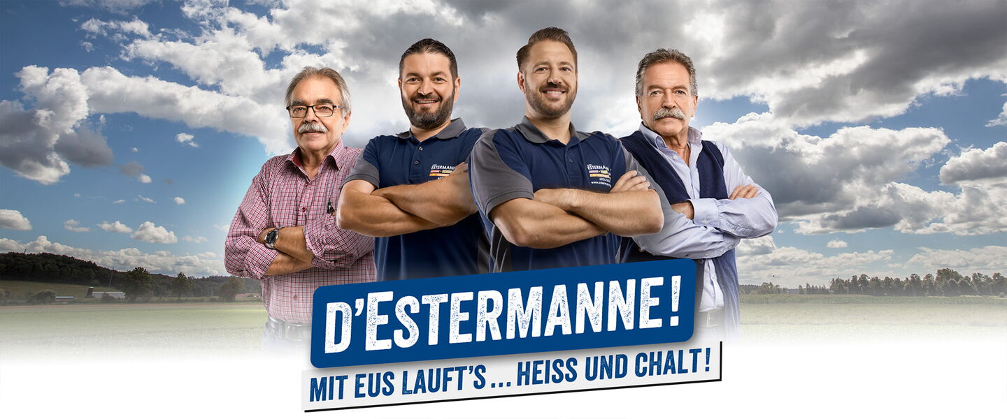 4 Handwerker vor Wiese und Wolkenhimmel